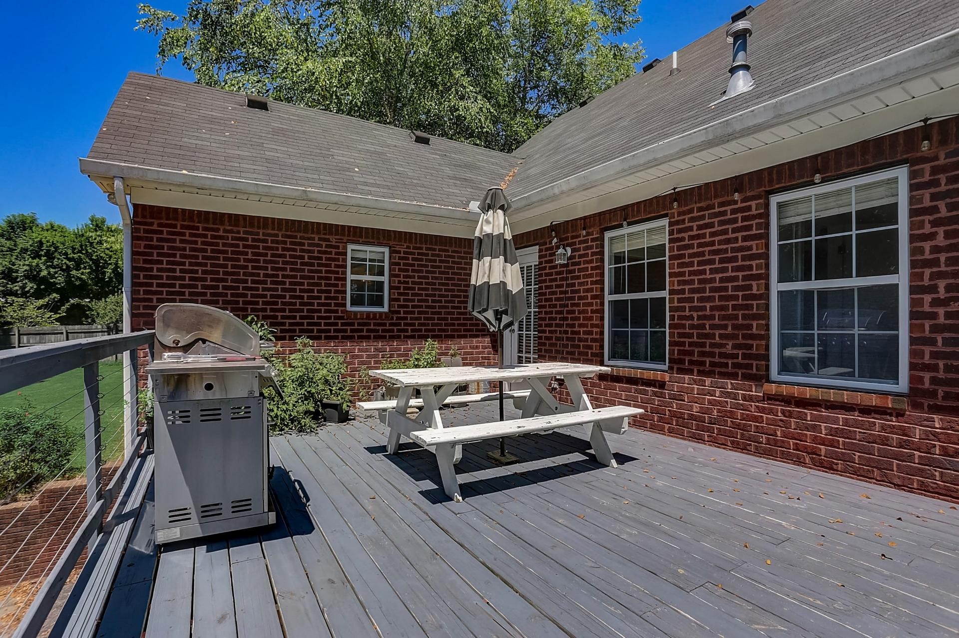 7532 King Road Fairview, TN 37062 - Photo 55 of 64 a view of house with a chairs and table in a patio