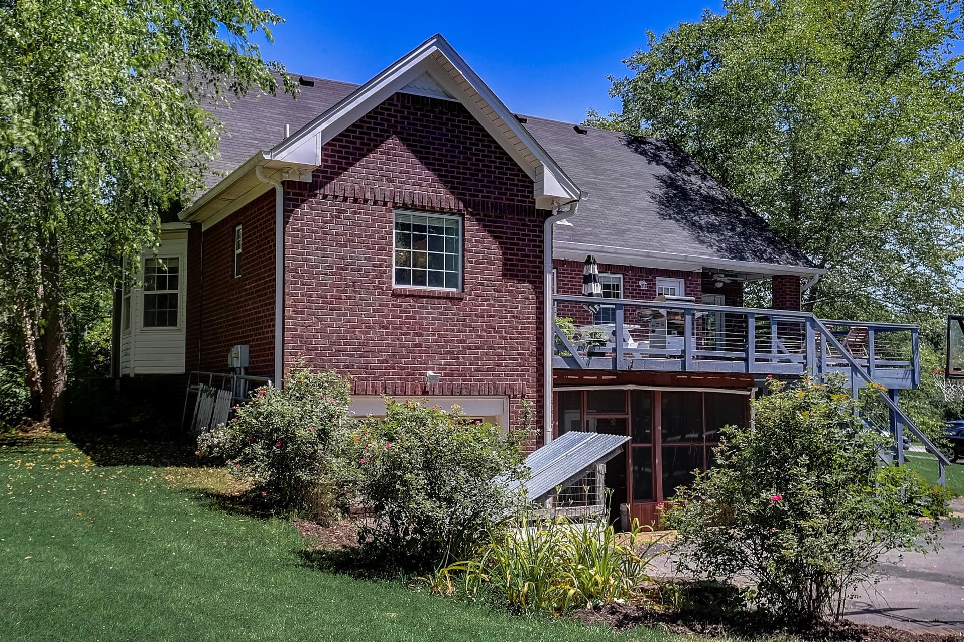 7532 King Road Fairview, TN 37062 - Photo 57 of 64 a front view of a house with a garden
