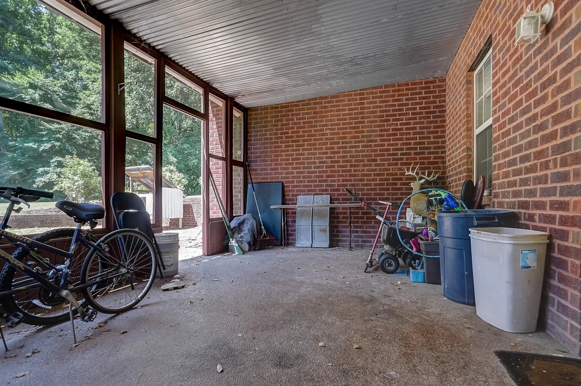 7532 King Road Fairview, TN 37062 - Photo 60 of 64 a view of a chairs and table in the back yard of the house