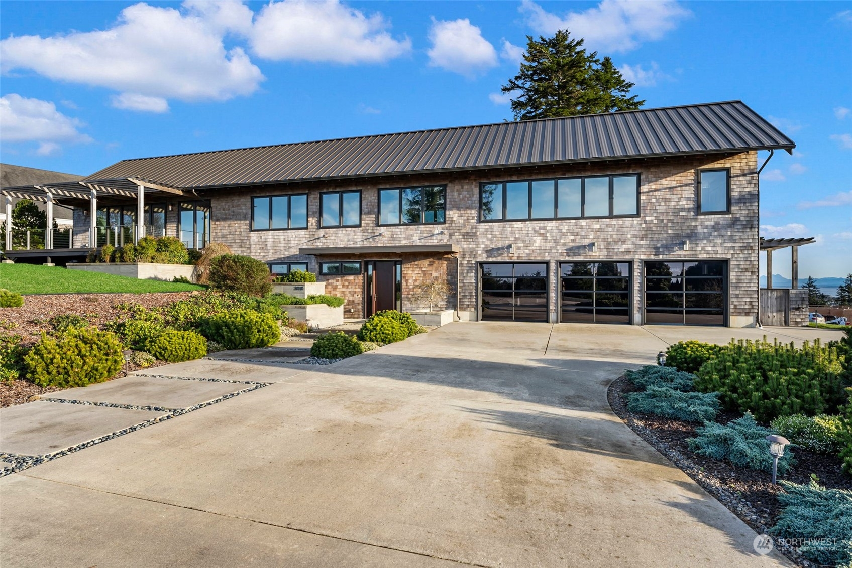 front view of a house with a yard