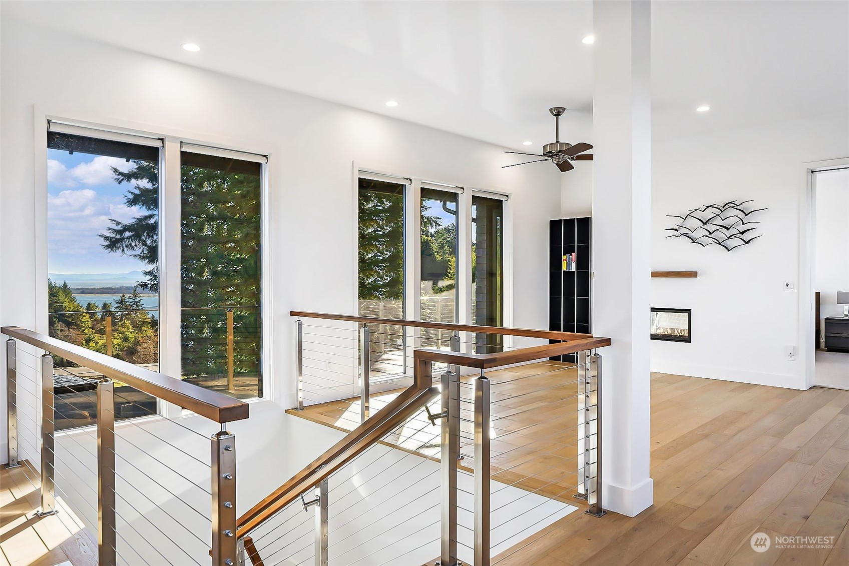 3010 Lighthouse Keepers Road Ilwaco, WA 98624 - Photo 16 of 38 a view of a livingroom with furniture stairs
