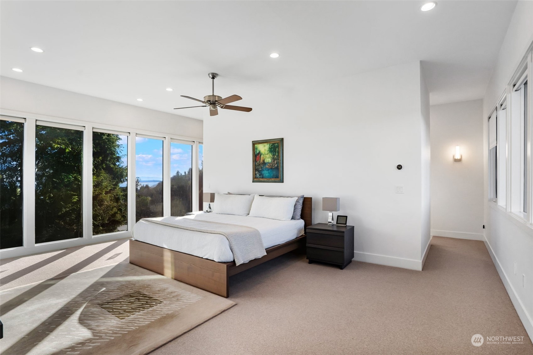 3010 Lighthouse Keepers Road Ilwaco, WA 98624 - Photo 19 of 38 a bedroom with a bed and a large window