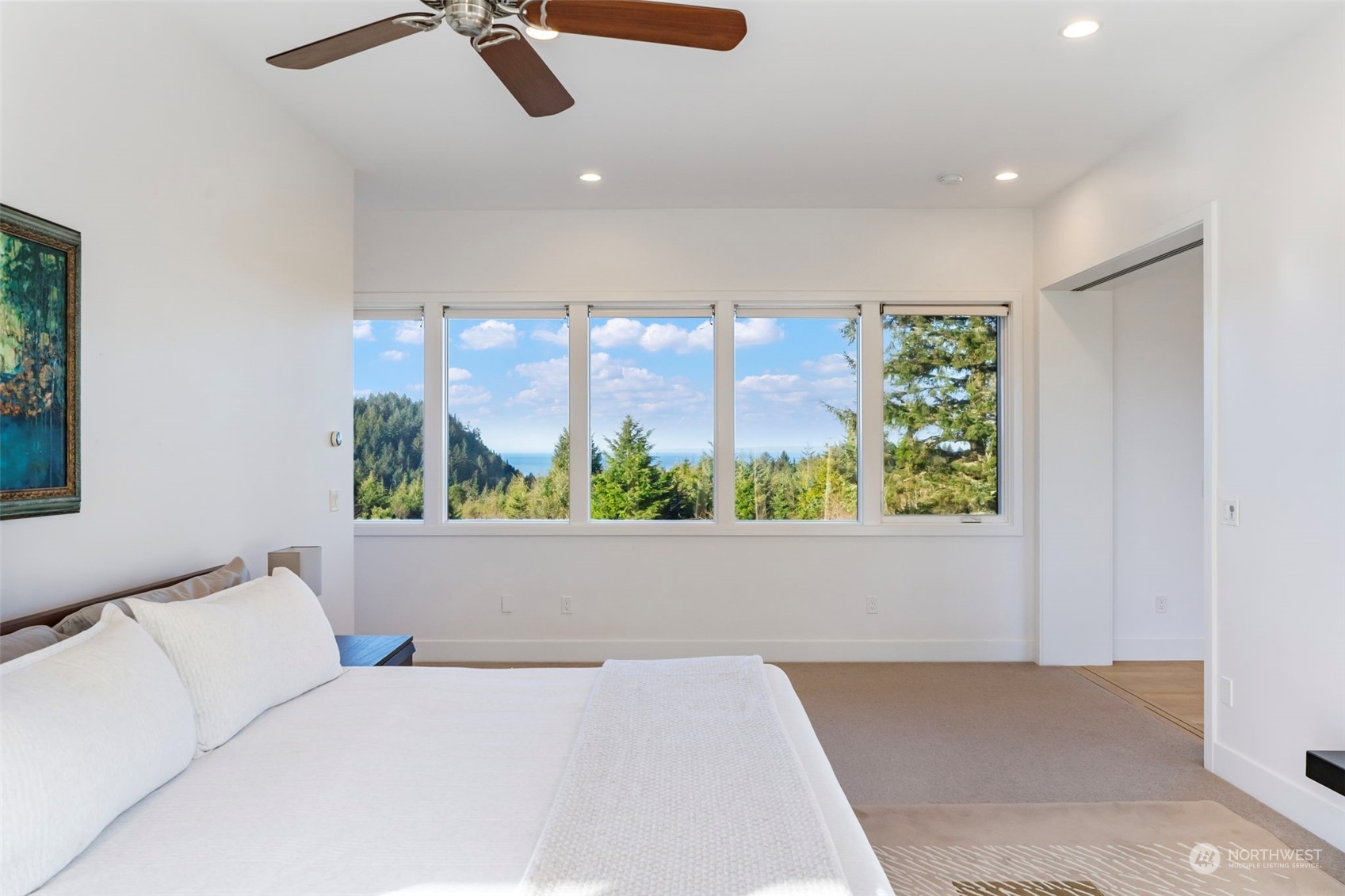 3010 Lighthouse Keepers Road Ilwaco, WA 98624 - Photo 20 of 38 a living room with furniture and a large window