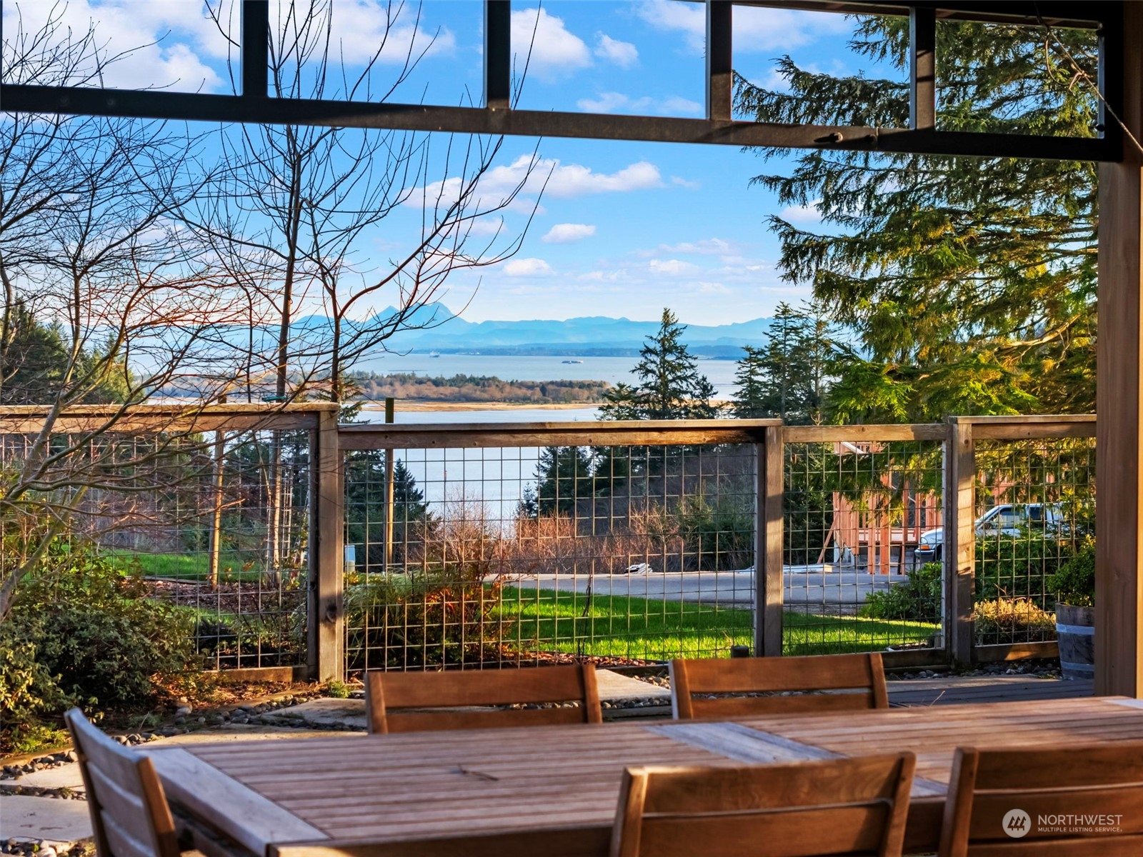 3010 Lighthouse Keepers Road Ilwaco, WA 98624 - Photo 30 of 38 a view of a bench in front of building