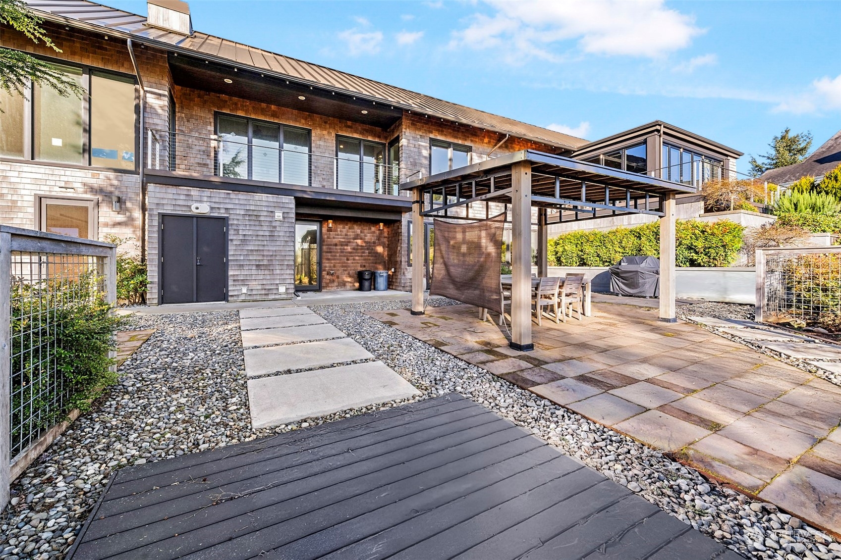 3010 Lighthouse Keepers Road Ilwaco, WA 98624 - Photo 34 of 38 a front view of a house with a garden