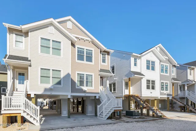 a front view of a building with many windows