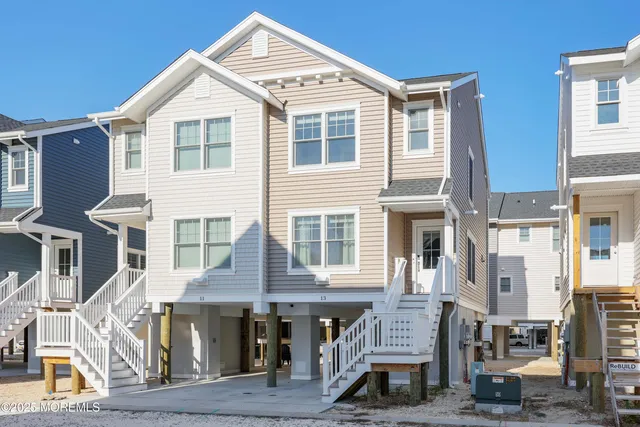 a front view of a building with many windows