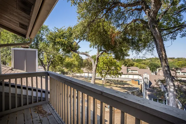 a view of a garden from a balcony