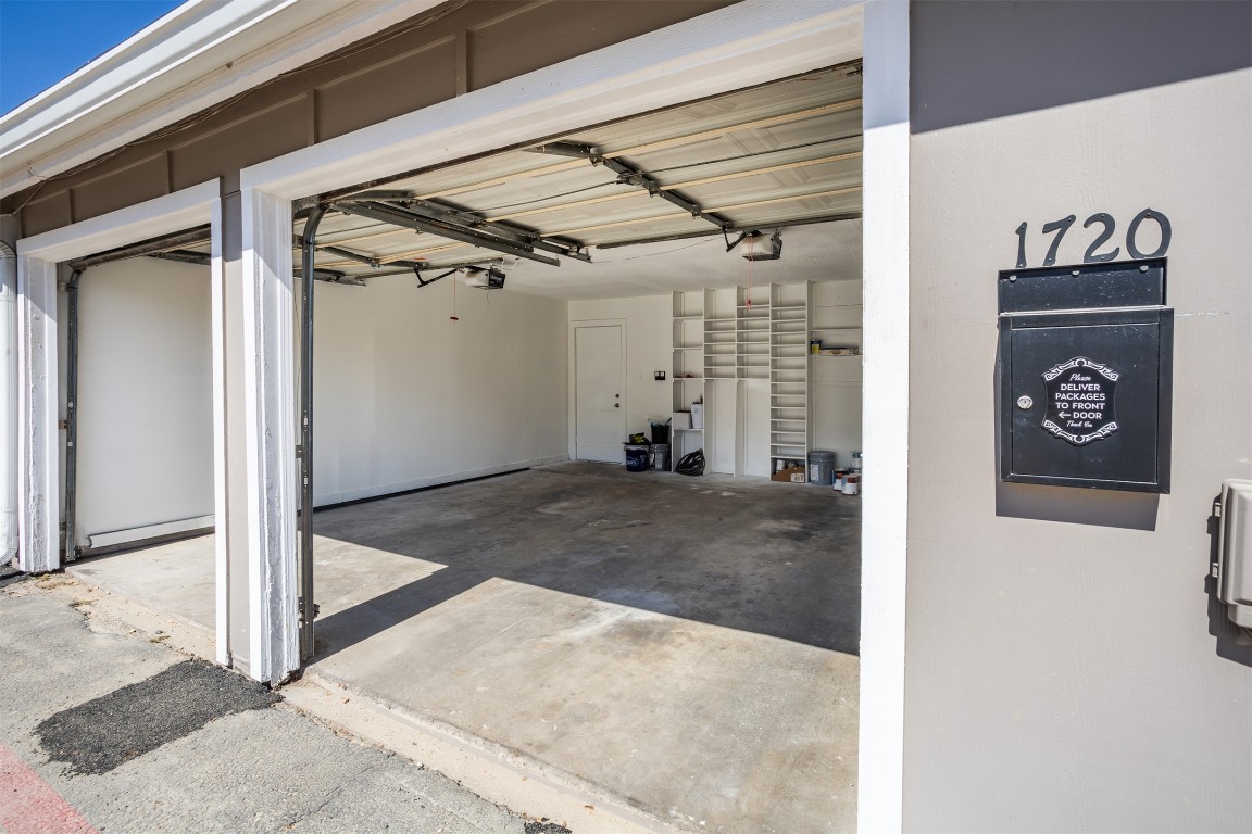 1720 Timber Ridge Drive Austin, TX 78741 - Photo 28 of 30 Big two car garage with lots of space for storage.