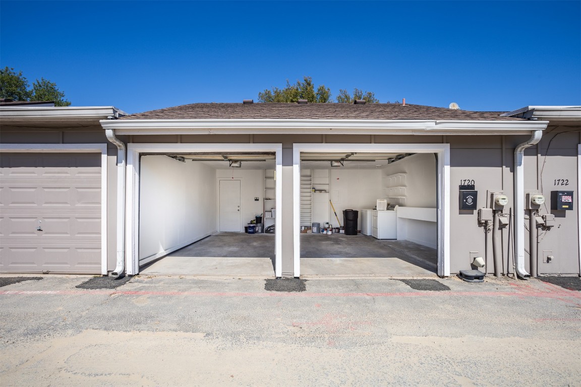 1720 Timber Ridge Drive Austin, TX 78741 - Photo 29 of 30 Garage is attached to the Townhome and in the rear of the townhome.