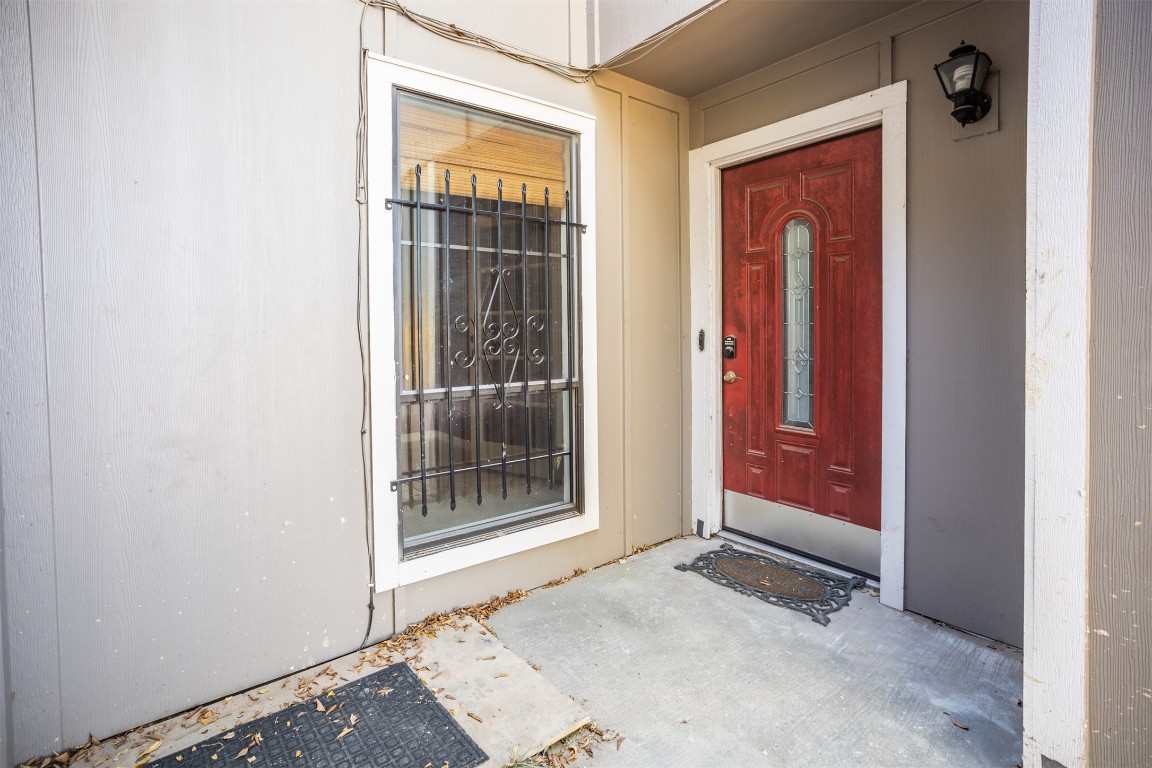 1720 Timber Ridge Drive Austin, TX 78741 - Photo 4 of 30 Front door of the townhome. Its under construction at the moment