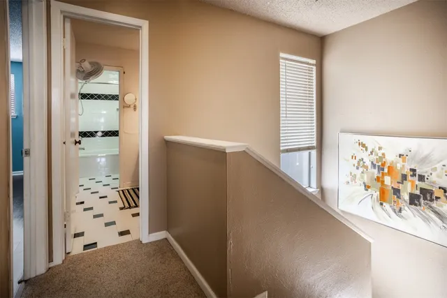 a view of a hallway with interior of the house