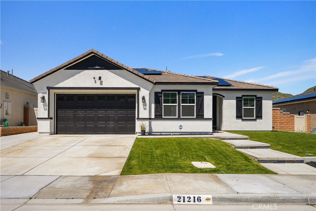 21216 Bison Mesa Road Riverside, CA 92507 - Photo 1 of 1 a front view of a house with a yard