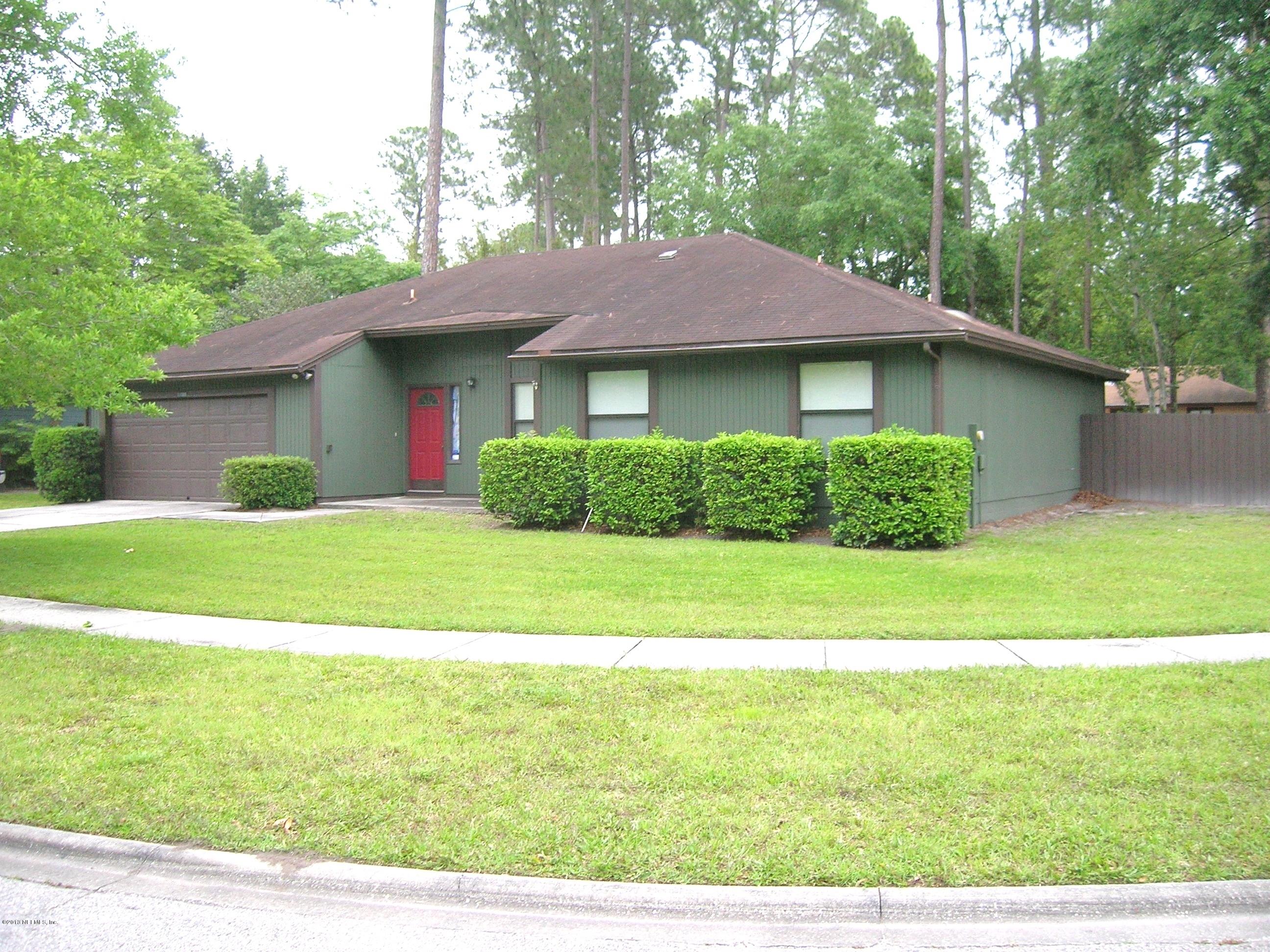11069 Reading Road Jacksonville, FL 32257 - Photo 1 of 18 a view of a house with a yard