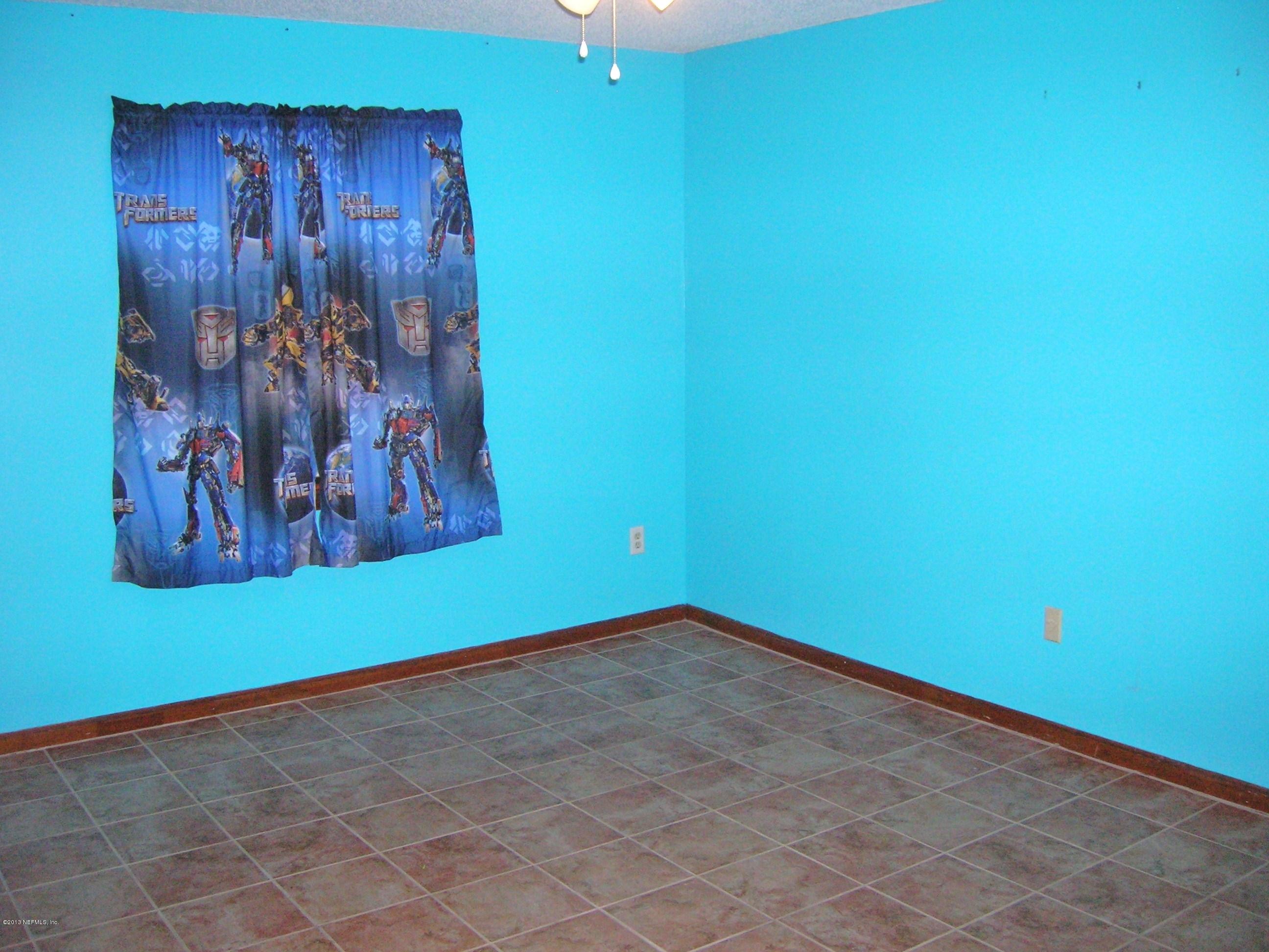 11069 Reading Road Jacksonville, FL 32257 - Photo 17 of 18 a view of a room with a large window