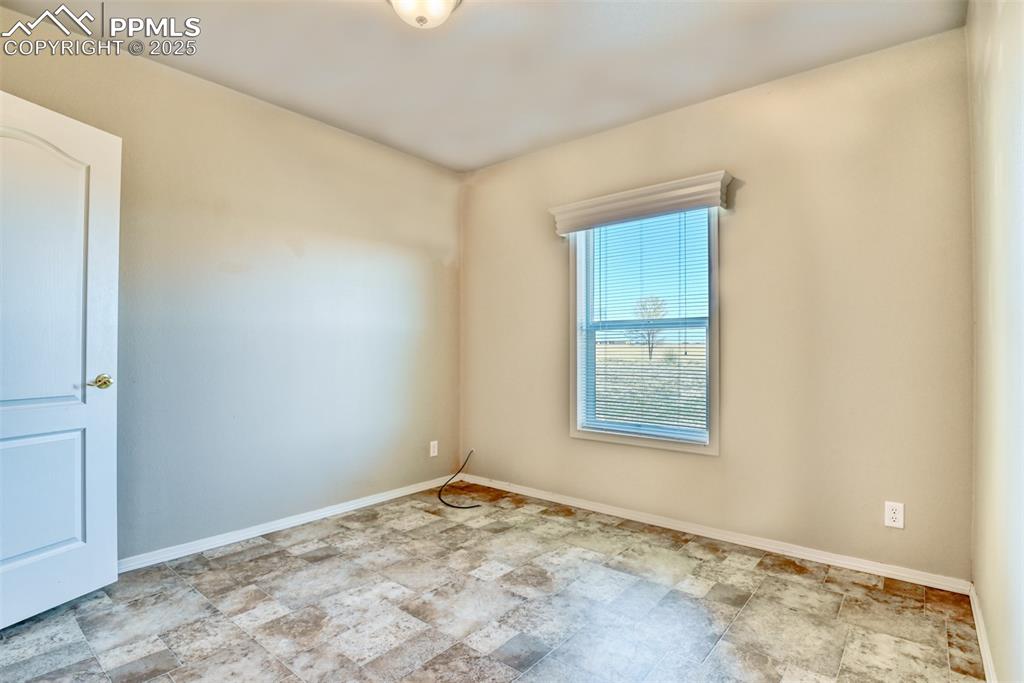 22500 Enoch Road Calhan, CO 80808 - Photo 23 of 29 an empty room with a window
