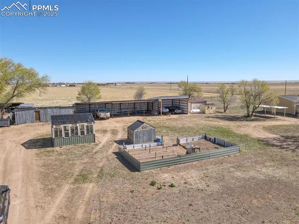 a view of a terrace with chairs