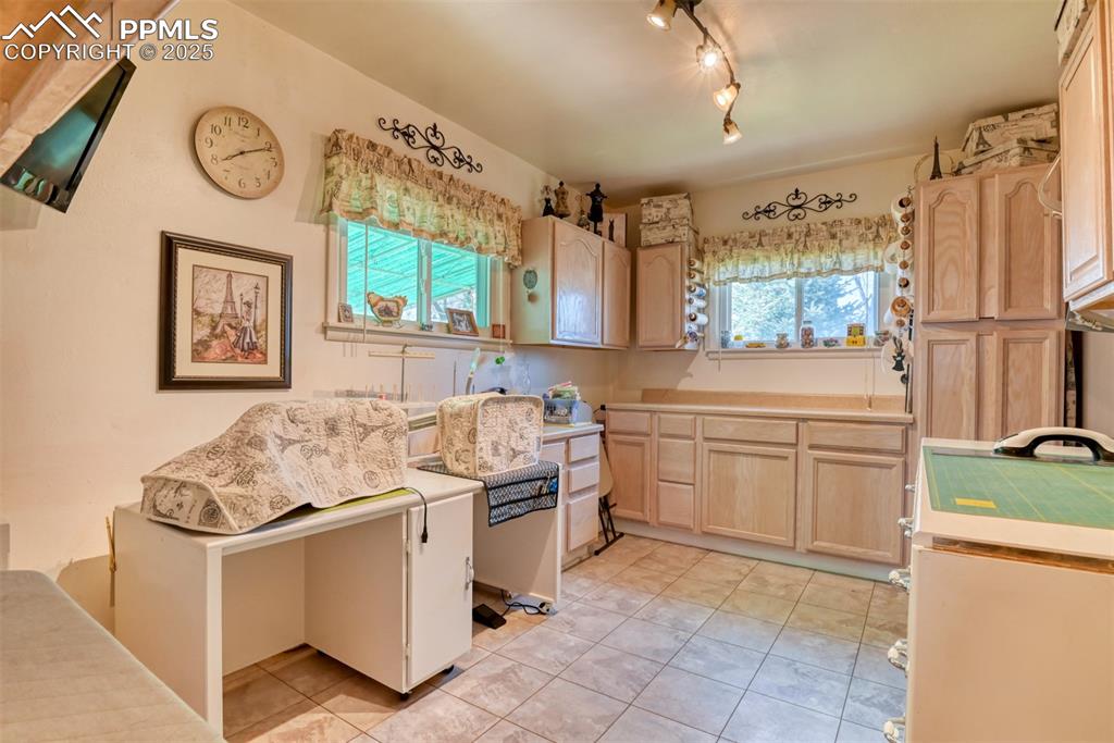 22500 Enoch Road Calhan, CO 80808 - Photo 7 of 29 a kitchen with a stove and a refrigerator