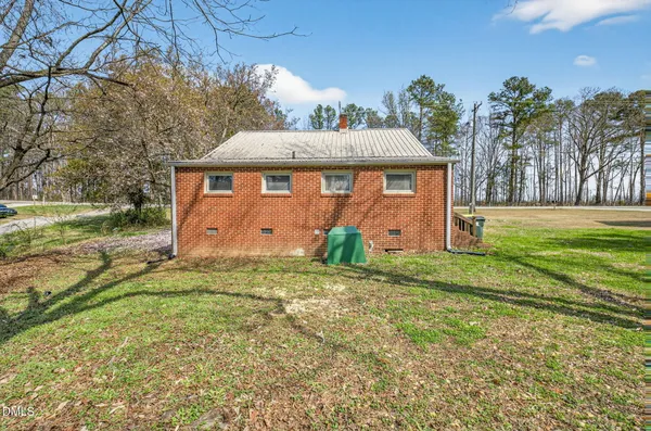 a view of a swimming pool and a porch