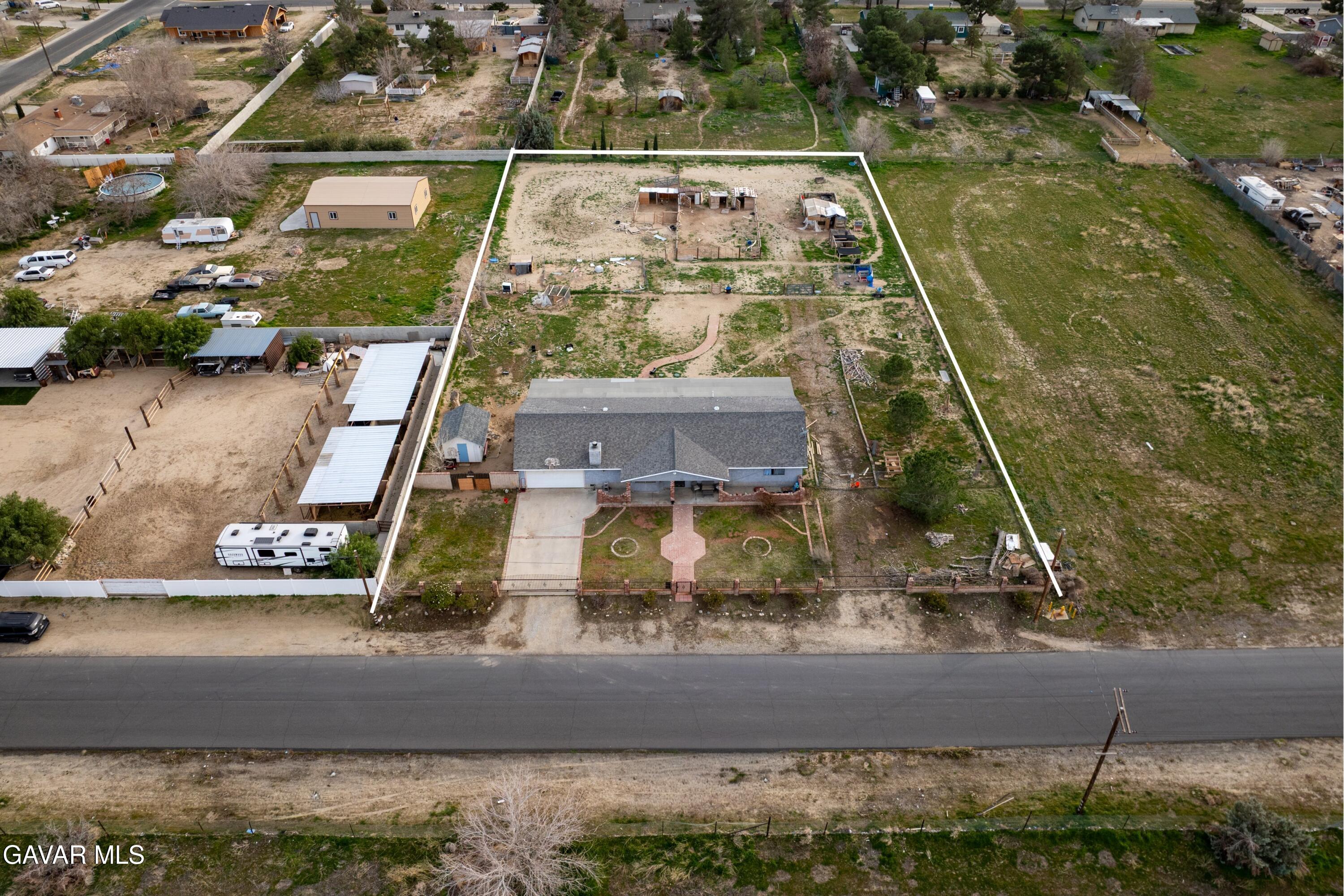 9340 East Ave R 10 Littlerock, CA 93543 - Photo 19 of 33 a view of swimming pool with a yard