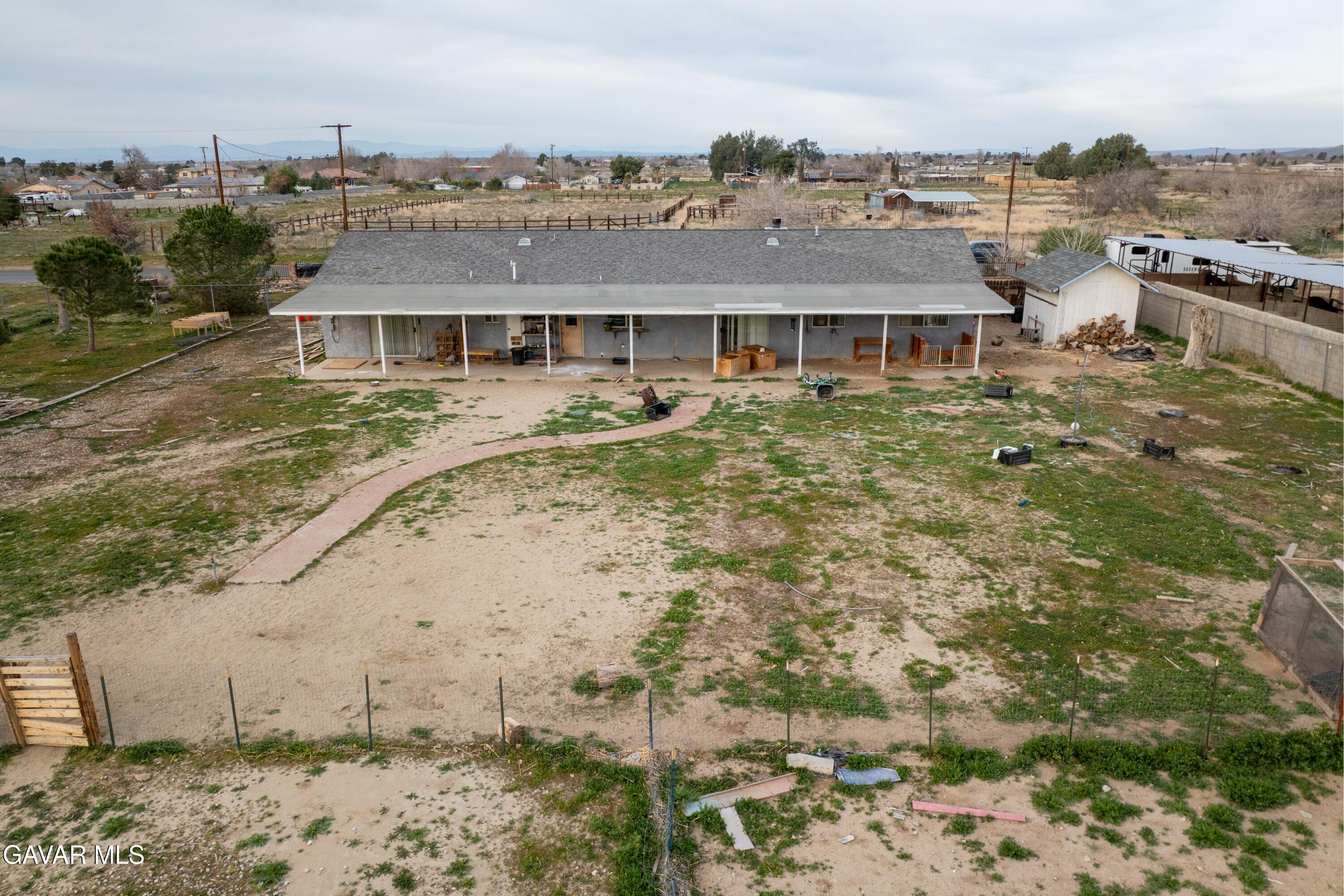 9340 East Ave R 10 Littlerock, CA 93543 - Photo 24 of 33 a aerial view of a house with a yard