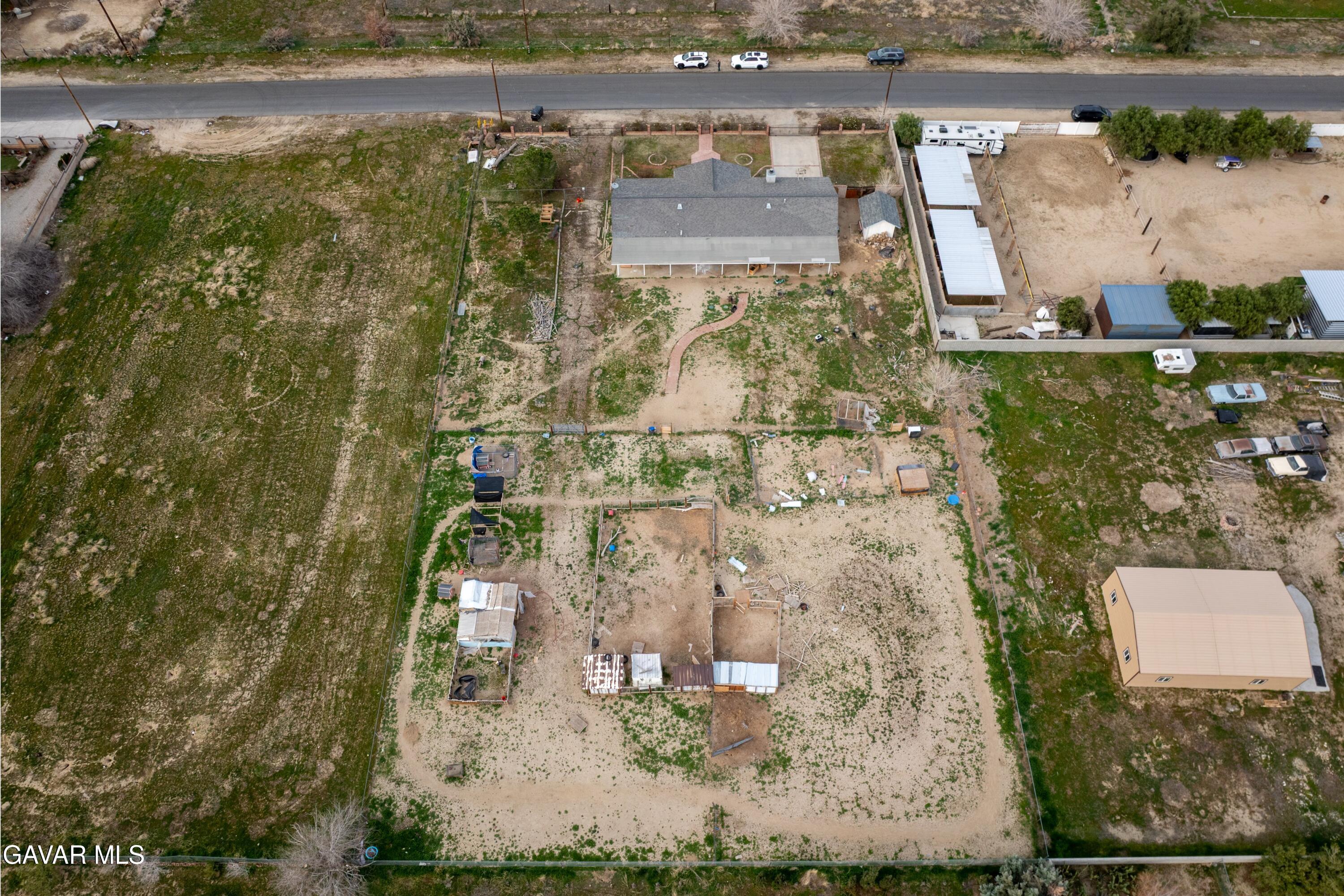 9340 East Ave R 10 Littlerock, CA 93543 - Photo 30 of 33 a aerial view of a house with a yard