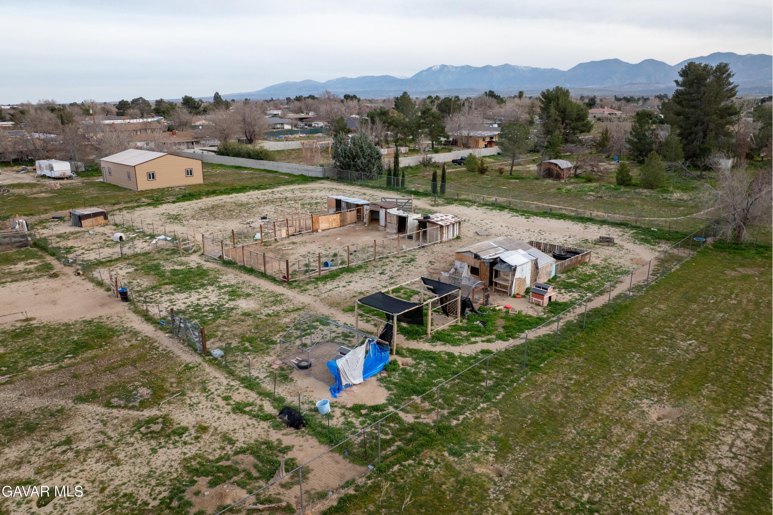 9340 East Ave R 10 Littlerock, CA 93543 - Photo 31 of 33 an aerial view of a house with a mountain
