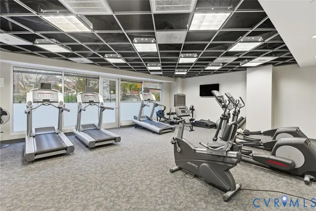 a front view of a building with sitting area