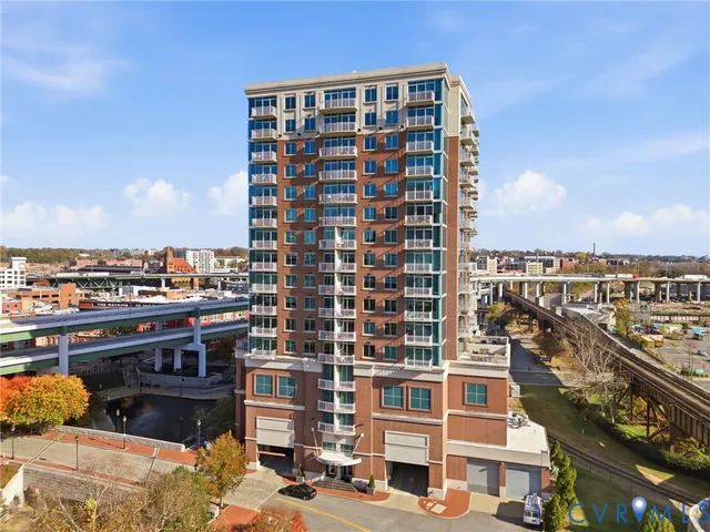 a view of a city with tall buildings