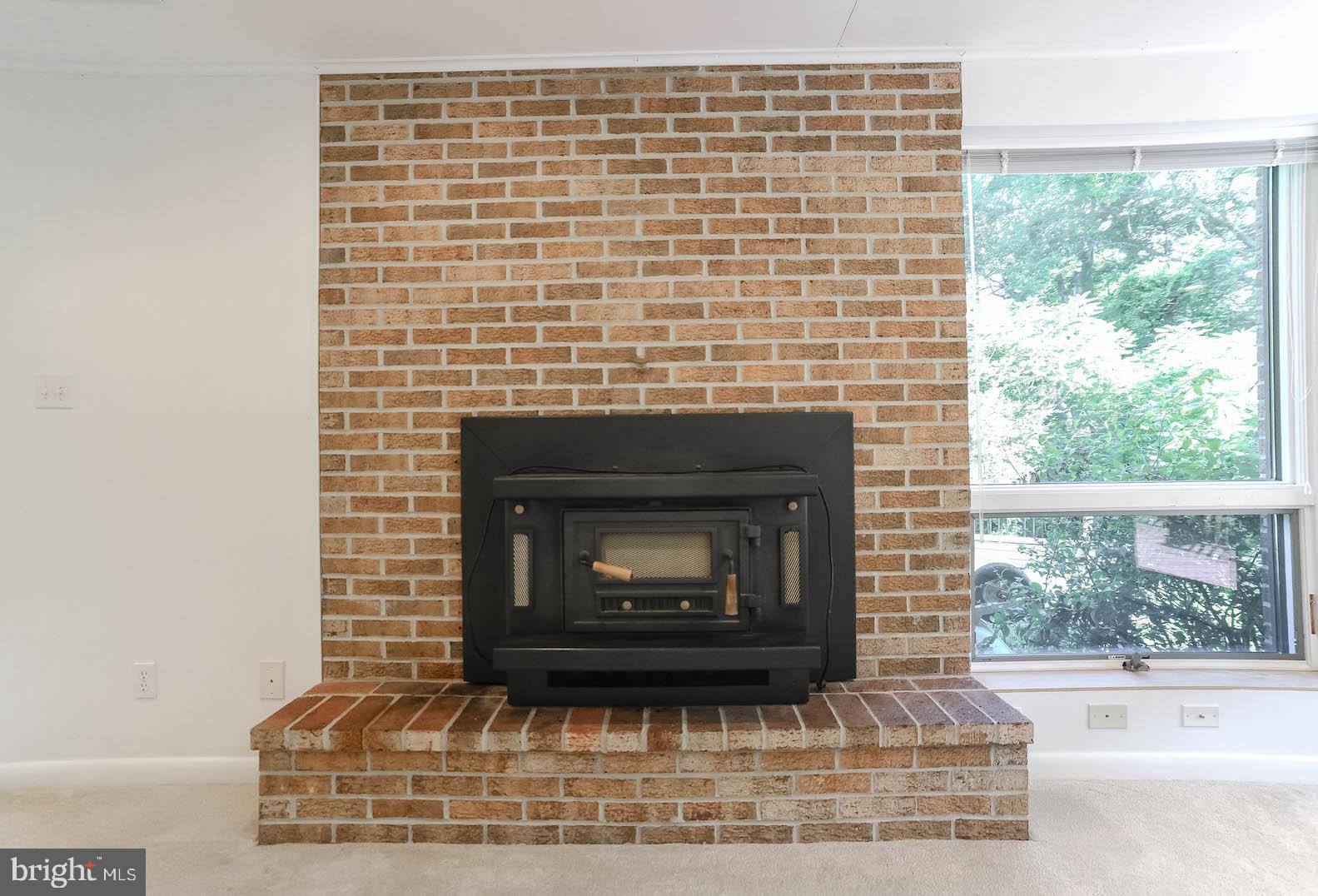 3444 Atropa Road Port Republic, MD 20676 - Photo 41 of 76 Lower level wood stove