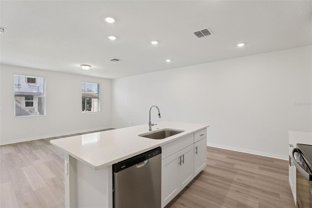 4264 Ranch House Road St. Cloud, FL 34772 - Photo 30 of 74 a kitchen that has a sink in it