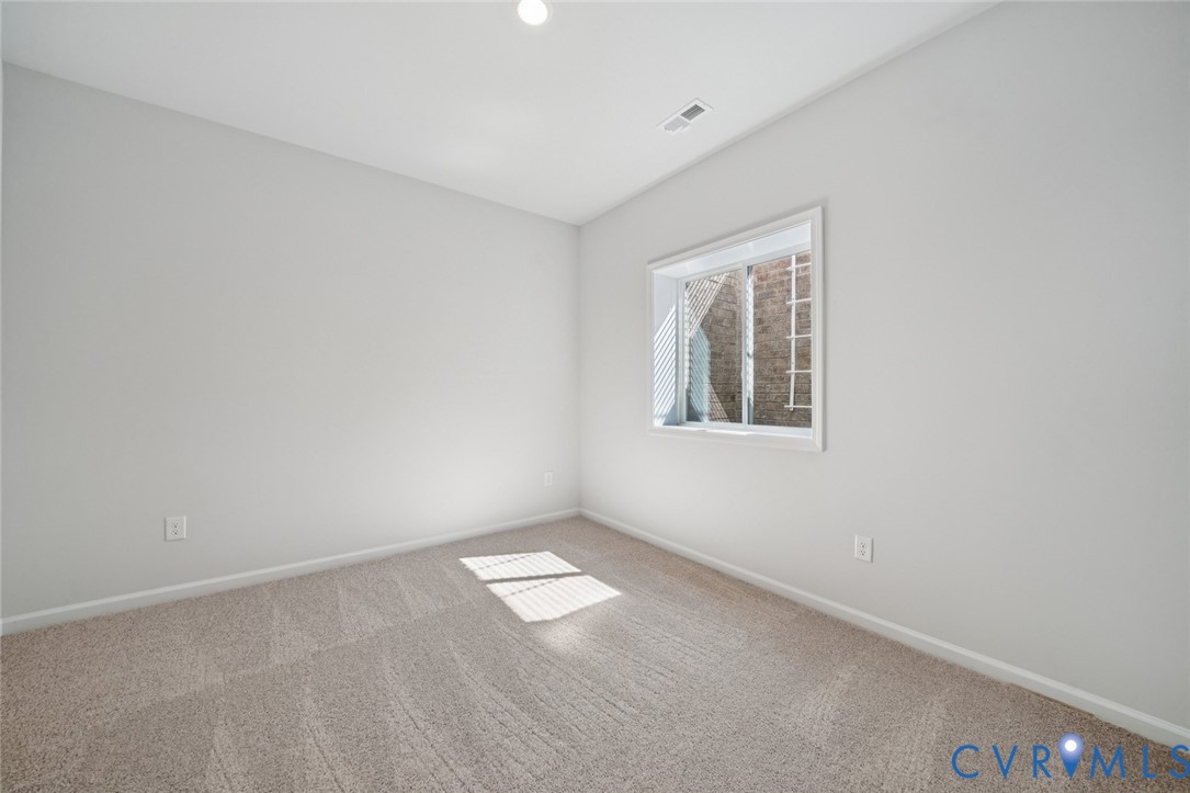 340 Mt Mccauley Way Aylett, VA 23009 - Photo 20 of 48 an empty room with a window