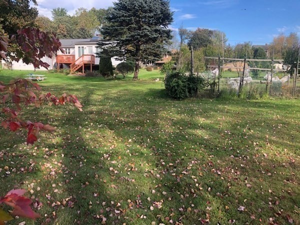 218 Granby Road Chicopee, MA 01013 - Photo 13 of 21 a backyard of a house with lots of green space