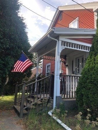 218 Granby Road Chicopee, MA 01013 - Photo 6 of 21 a view of small house with a yard