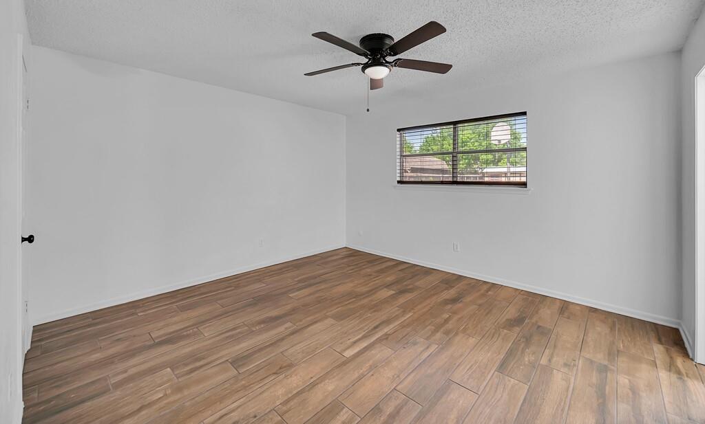 216 Texas Avenue Hewitt, TX 76643 - Photo 15 of 32 a view of an empty room with a window