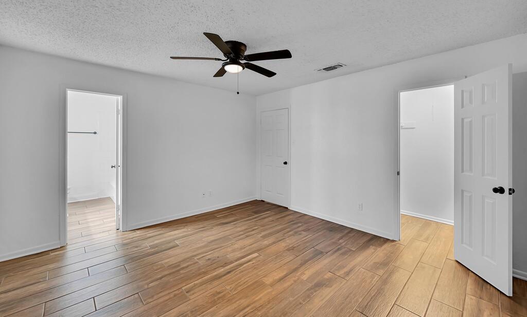 216 Texas Avenue Hewitt, TX 76643 - Photo 16 of 32 a view of empty room with wooden floor
