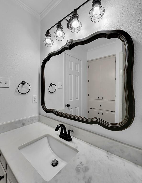 216 Texas Avenue Hewitt, TX 76643 - Photo 18 of 32 a bathroom with a sink and a mirror