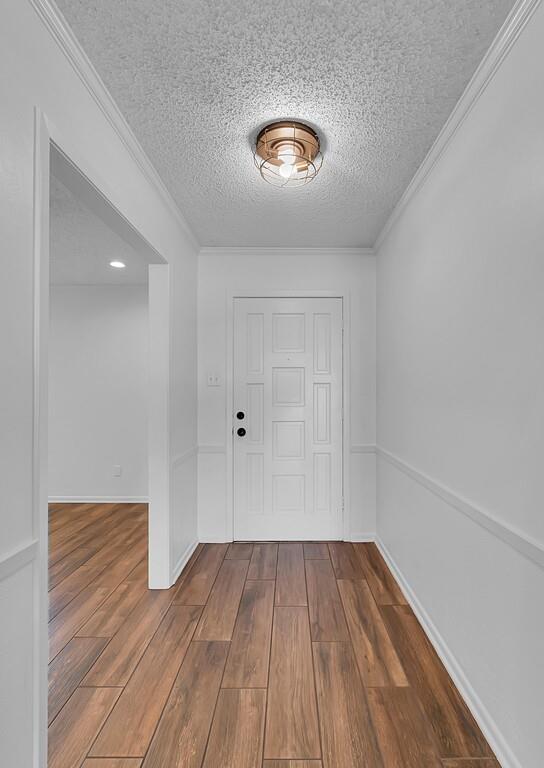 216 Texas Avenue Hewitt, TX 76643 - Photo 2 of 32 a view of a room with wooden floor