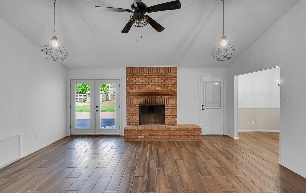 216 Texas Avenue Hewitt, TX 76643 - Photo 4 of 32 a view of a room with wooden floor and a window