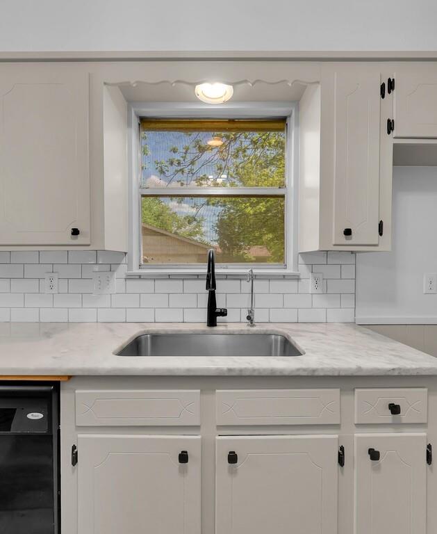 216 Texas Avenue Hewitt, TX 76643 - Photo 10 of 32 a kitchen with a sink and a window