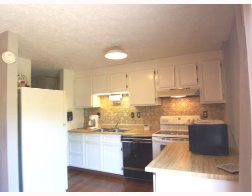 112 Raccoon Way Gibsonia, PA 15044 - Photo 4 of 9 Kitchen. Easy kitchen to work in new refrigerator and eletric cook top stove