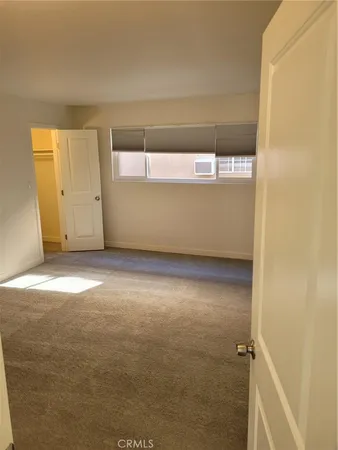 an empty room with a door