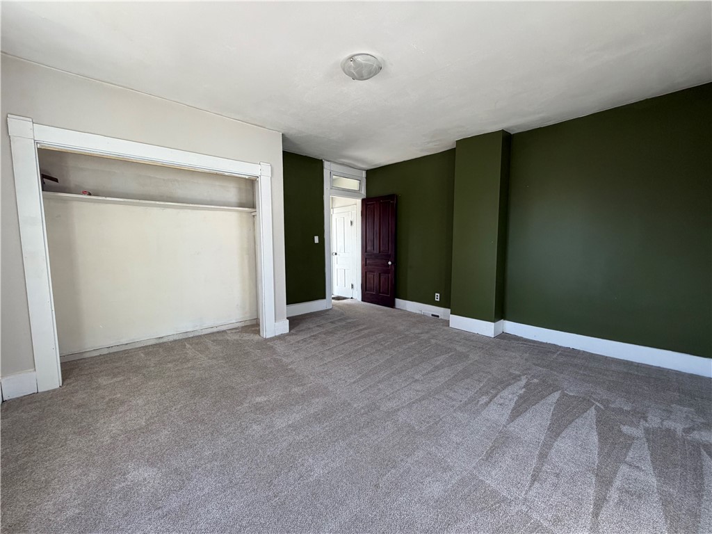 230 West Decatur Street Eaton, OH 45320 - Photo 14 of 22 This spacious room features a comfortable flooring, ample closet space, and natural light.