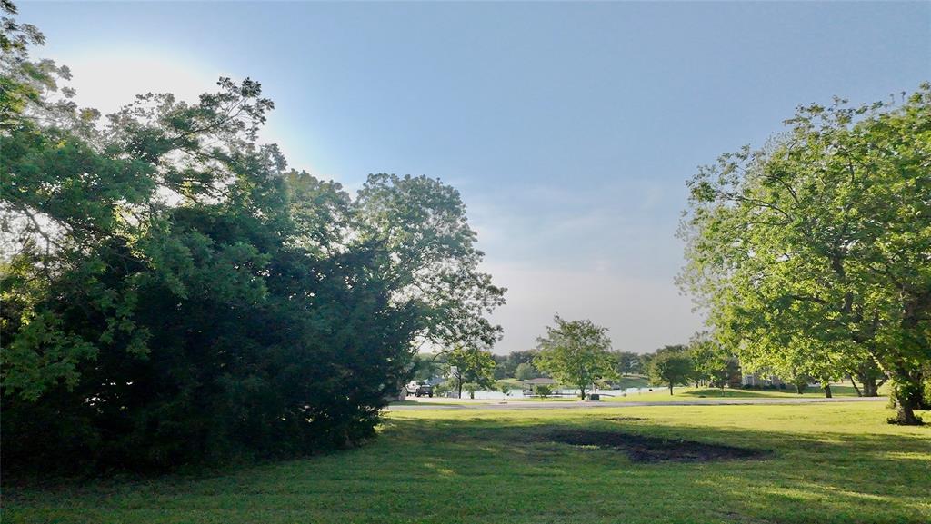 Lot 71 Shoreline Road Kerens, TX 75144 - Photo 11 of 24 a view of a golf course with a trees