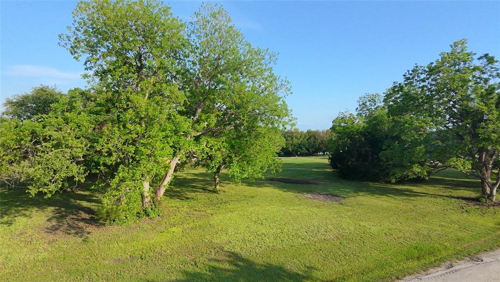 Lot 71 Shoreline Road Kerens, TX 75144 - Photo 16 of 24 a view of an outdoor space and a yard