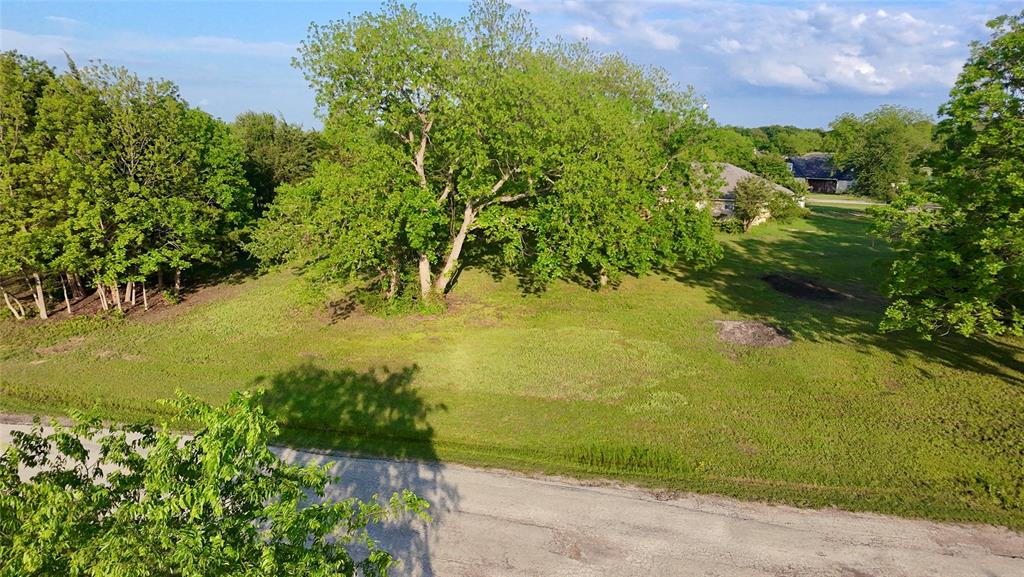 Lot 71 Shoreline Road Kerens, TX 75144 - Photo 10 of 24 a view of a lake with a yard