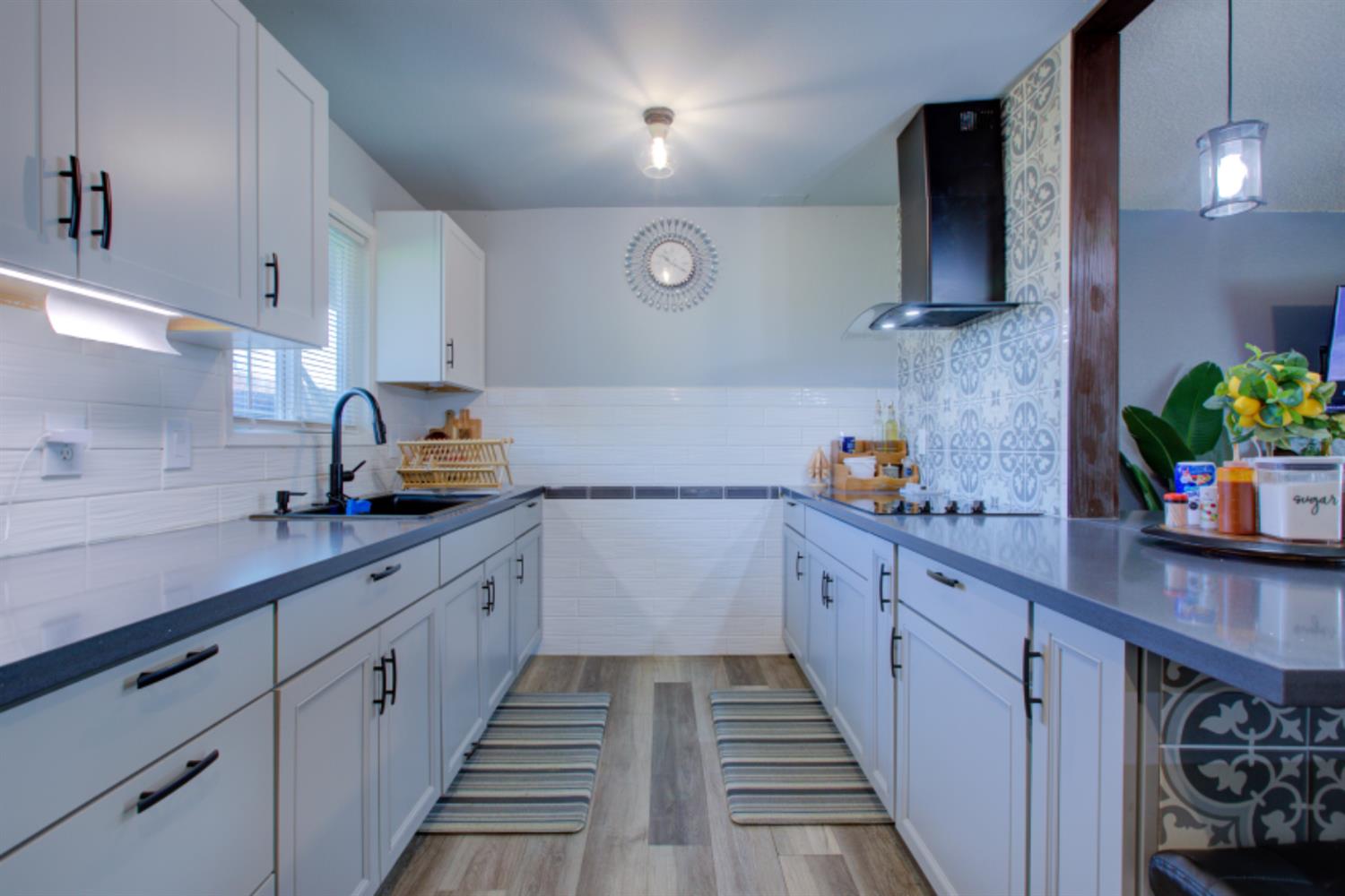 7139 Center Street Winton, CA 95388 - Photo 13 of 36 a kitchen with sink and cabinets