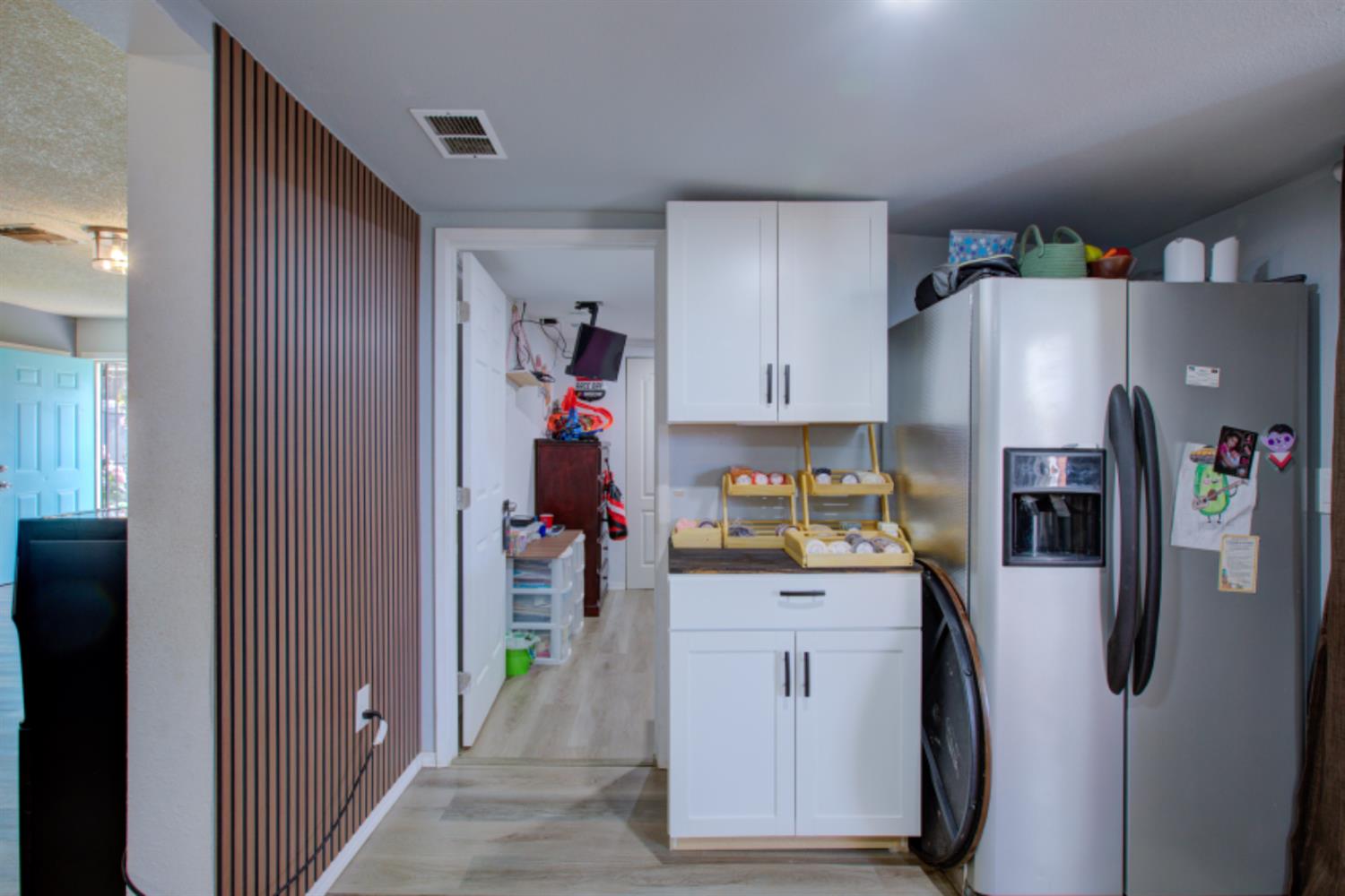 7139 Center Street Winton, CA 95388 - Photo 18 of 36 a kitchen with refrigerator and car