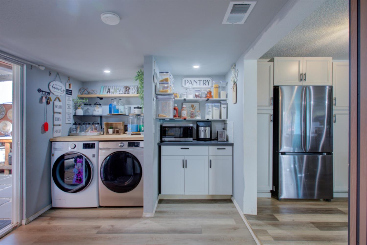 7139 Center Street Winton, CA 95388 - Photo 20 of 36 a view of a kitchen with stainless steel appliances granite countertop a refrigerator and a stove top oven