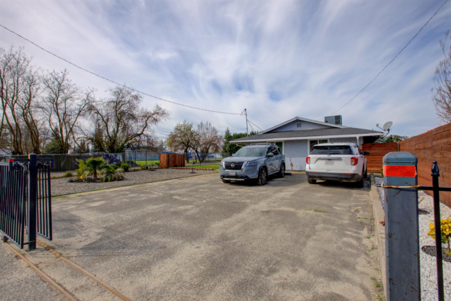 7139 Center Street Winton, CA 95388 - Photo 2 of 36 a view of a cars park in front of a building